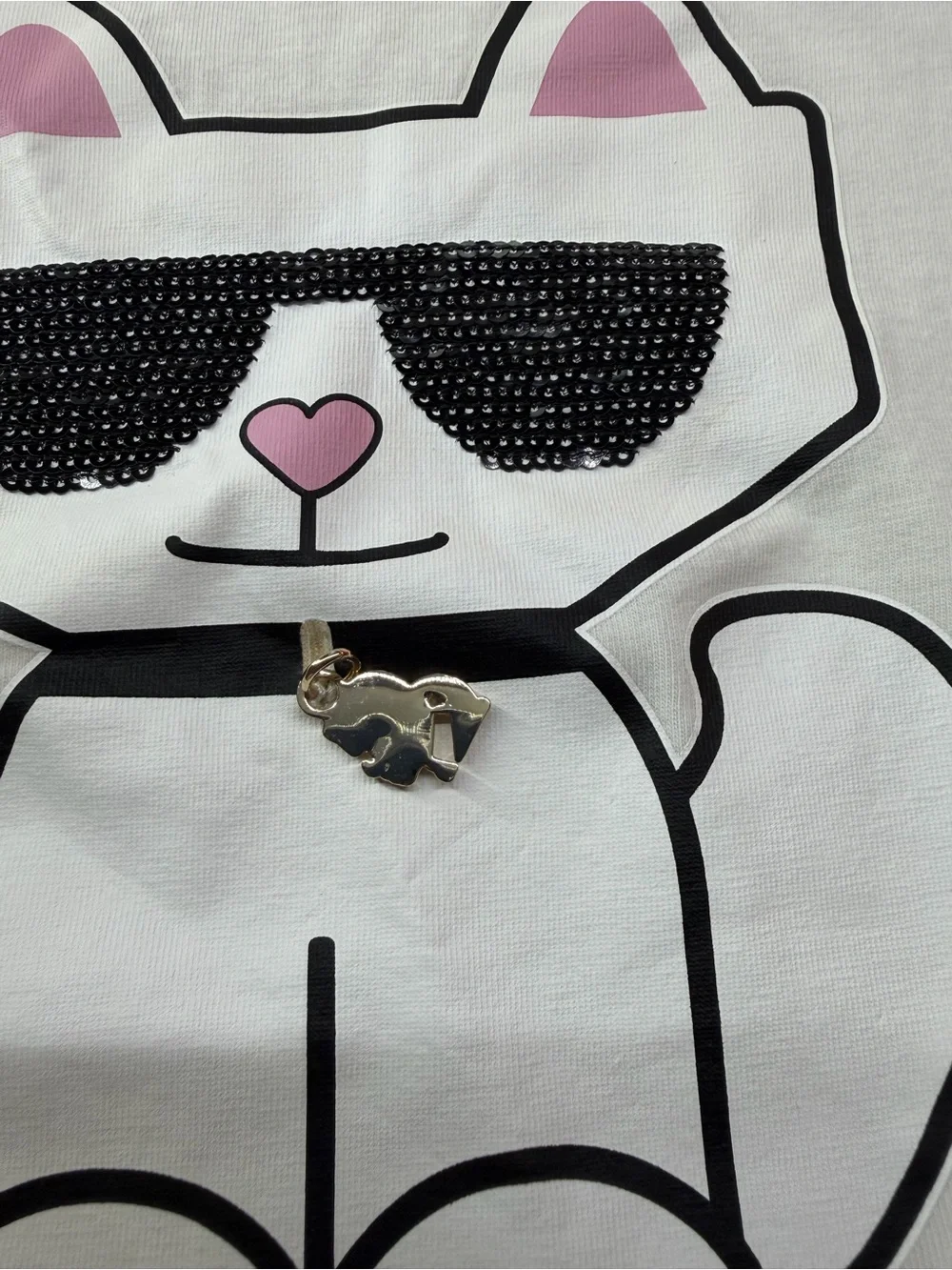 Karl Lagerfeld White Tee with Beige Cat Graphic and Pink Ear Accents